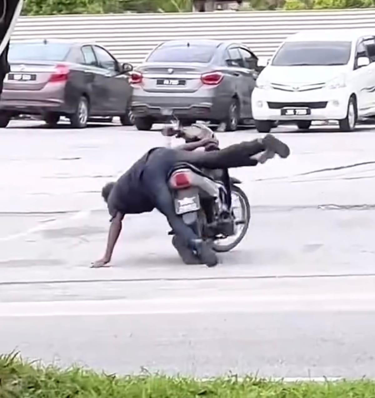 2 Guys Falling on Motorbike