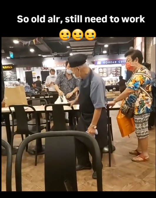 Old man seen working in Kopitiam