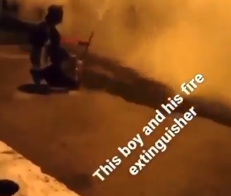 YP playing with fire extinguisher to create a smoke screen